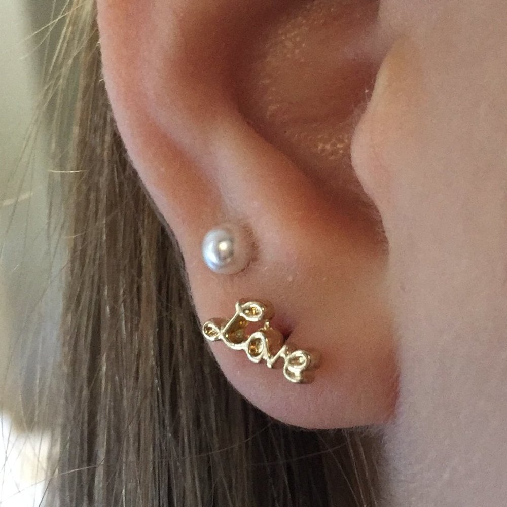 gold "love" earrings